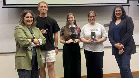 Image of two teachers and three students holding Samsung Galaxy Z Flip 5 phones.